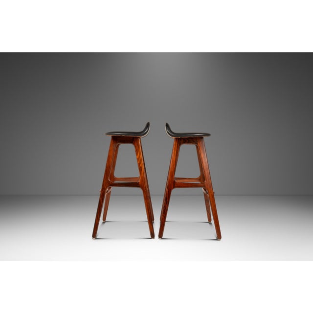 Introducing a limited set of two Model OD-61 counter-height barstools designed by the influential Erik Buch for the lauded...