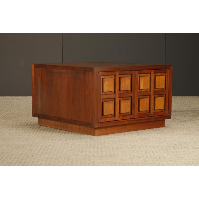 Striking vintage end table/cabinet by Lane (unsigned), featuring a bold paneled façade with geometric relief detailing...