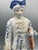 Charming vintage Italian porcelain figural pair featuring a gentleman and lady in beautifully detailed period dress. The...