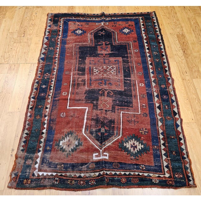 A superb and highly collectible Fachralo Kazak prayer rug from the late 19th century, distinguished by its glowing...