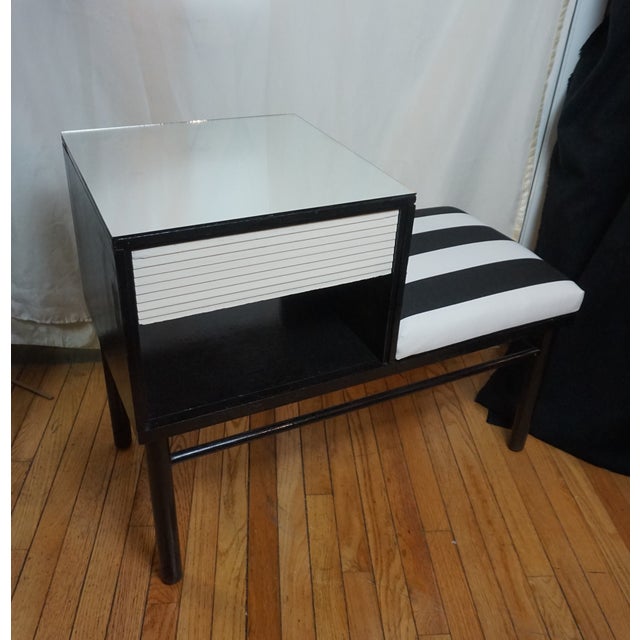 Raymond Loewy prolific French-American designer drew this phone table up for Mengel in the early 50s nice elegant touchs....