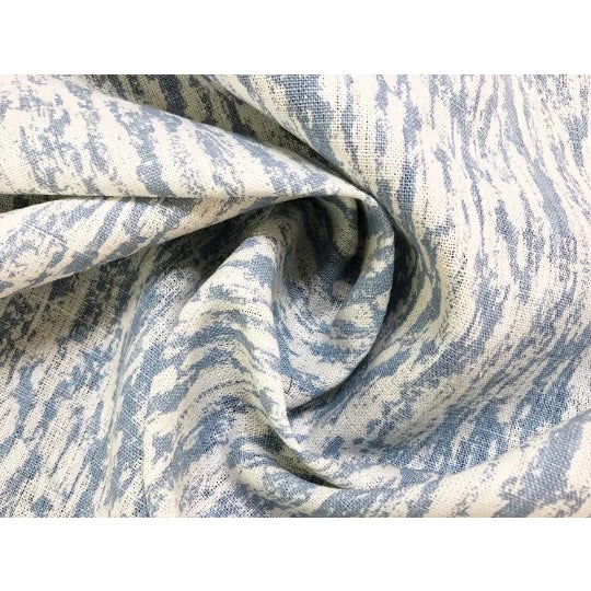 54" wide Scalamandre Sequoia linen print sky abstract faux bois drapery fabric in blue and ivory. Price is per yard.