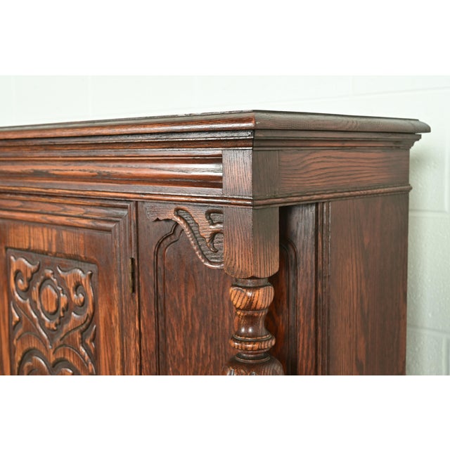 Berkey & Gay Style Antique English Jacobean Carved Oak Bar Cabinet, Circa 1920s For Sale - Image 9 of 16