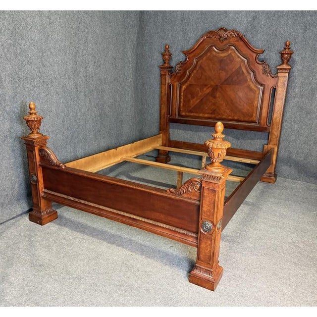 This contemporary bed frame features a richly finished wood construction with an elegant arched headboard showcasing...