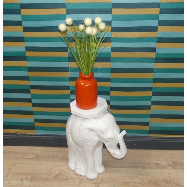 This highly decorative piece is incredibly versatile. Sturdy ceramic side table in the elegant shape of an elephant. All...
