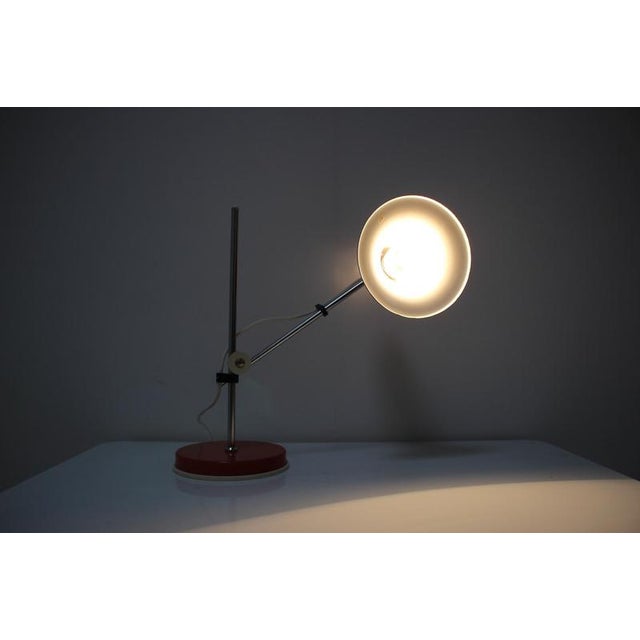 Adjustable table lamp from the 1970's, made in Hungary. Made of metal and chrome. Fully functional, in original condition....