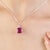 Featuring an 11 mm round-cut ruby weighing 7.2 carats, accented with 2.5 mm diamonds totaling 0.15 carat, this pendant is...
