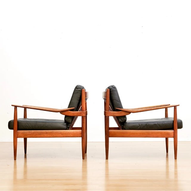 These mid-century lounge chairs were produced in the 1960s Attributed to Beka, Belgium. With stunning rosewood frames,...