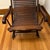 This is a stunning antique rocking chair featuring lo a rare style linked slat wood seat allowing the chair to adjust its...
