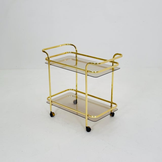1950s Mid Century Modern Martini Wine Bar Tea Cart Gold/Brass Glass Vintage Serving. Elevate your hosting game with this...