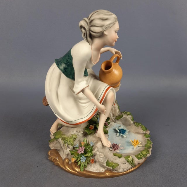 A fine capodimonte porcelain sculpture with a biscuit (matte) finish, signed by sculptor nico venzo. A classic example of...