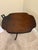 Charming vintage mahogany occasional table with a scalloped pie-crust edge top in a distinctive rectangular shape. The...
