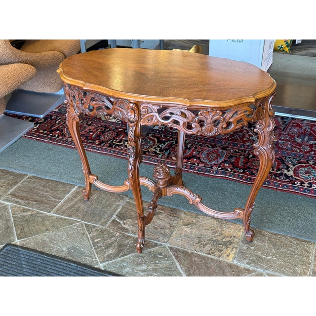Design Plus Gallery presents a Hand Carved Side Table from Italy. The timeless elegance of this hand carved walnut side...