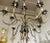 A wonderful Empire style Italian chandelier in the style of Buccellati. Rewired. 12 Light sources. Candelabra sockets....