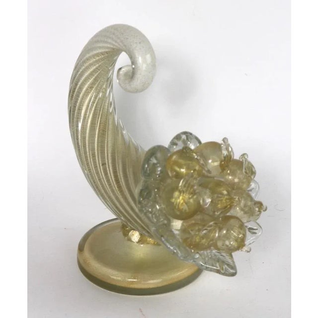 Wonderful pair of gold inclusion art glass cornucopias by Barovier and Toso, Murano, Italy, circa 1950s. Both show some...