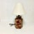 This is a Studio Pottery Folk Art Table Lamp from the Mid-Century, possibly the early 1970s. It features a six-sided body...