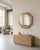 Large octagonal mirror made of mirrored crystal, brass frames, and a mirrored glass frame. The mirror consists of a...