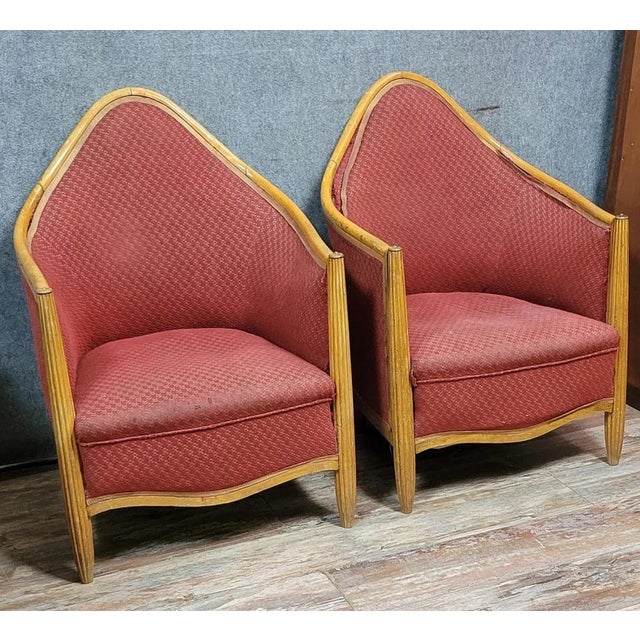 Pair of Art Deco armchairs after Paul Pollot (1877-1942) Light wood frame Upholstery needs cleaning Dimensions: h94 x 88 x...