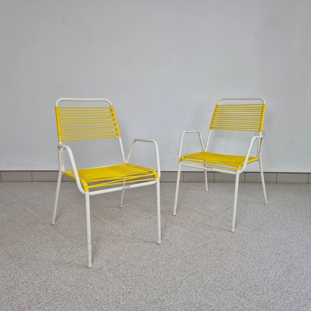 Mid-Century Modern Yellow Spaghetti Armchair from Mauser, 1970s, in Very Good conditions. Designed 1970 to 1979 This piece...