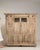 Crafted in France during the early nineteenth century, this distinguished oak cabinet exemplifies the refined sensibility...