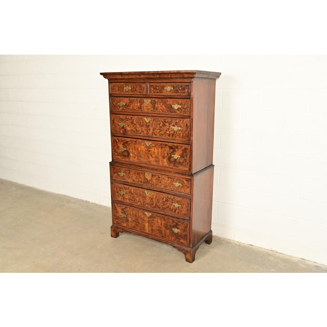 A gorgeous antique Chippendale, Queen Anne, or Georgian style eight-drawer highboy dresser or chest on chest From the...
