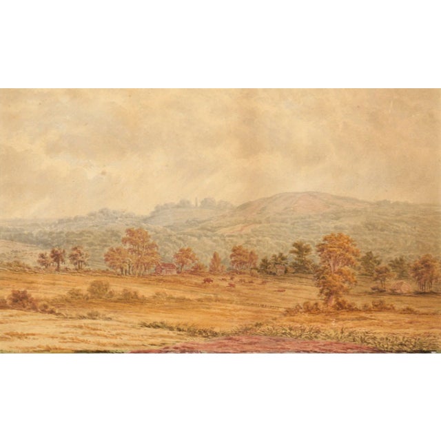 Serene cloudy landscape by Arthur Philemon Coleman (Canada, 1852-1939). From atop a hill, the viewer looks across a...