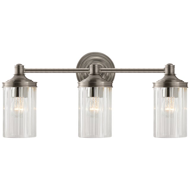Ava Triple Sconce in Antique Nickel with Crystal Designer: Alexa Hampton Height: 9.25" Extension: 6" Backplate: 4.5" Round...