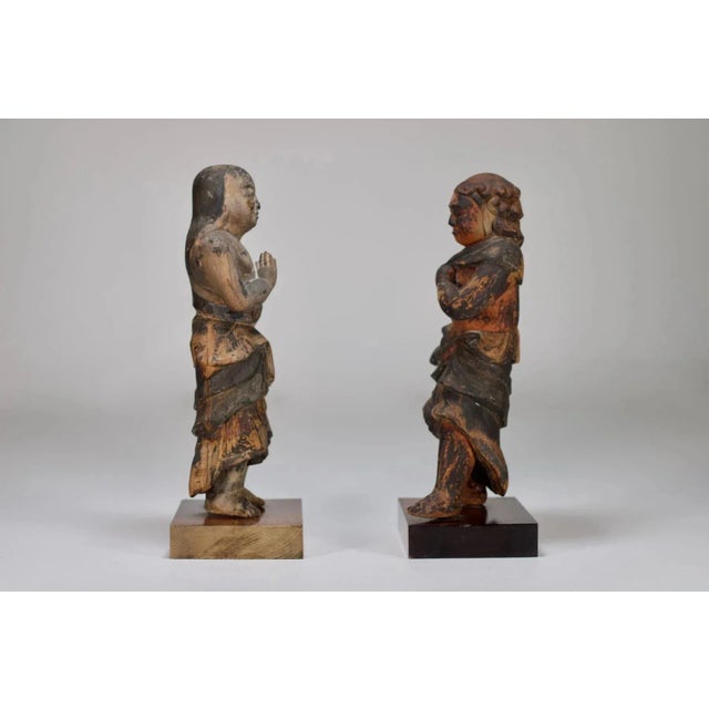 These characters represent two of the servants of Fudō Myōō, the central divinity of the five kings guardians, protectors...