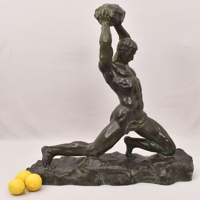 The Antique Bronze Statues, proposed here is a Male Figure, Warrior Man, a Man throwing a boulder, a stone, early 20th...