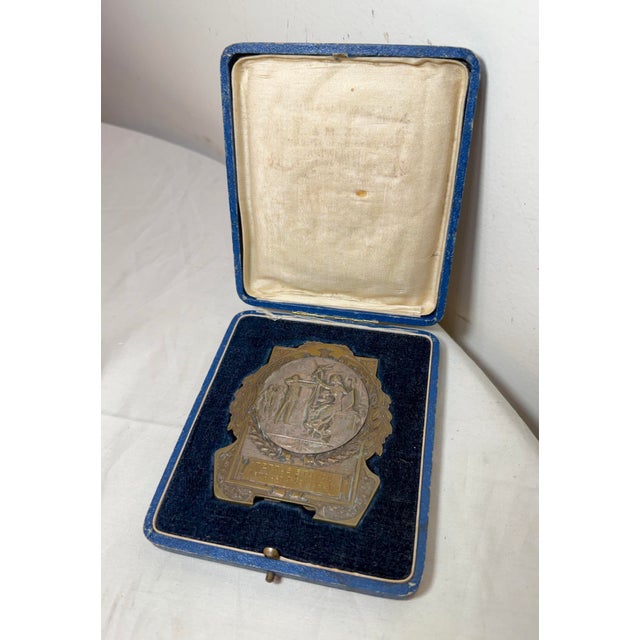 This high quality antique 1931 Dutch silver plated bronze archery trophy medal is a prestigious and unique piece for any...