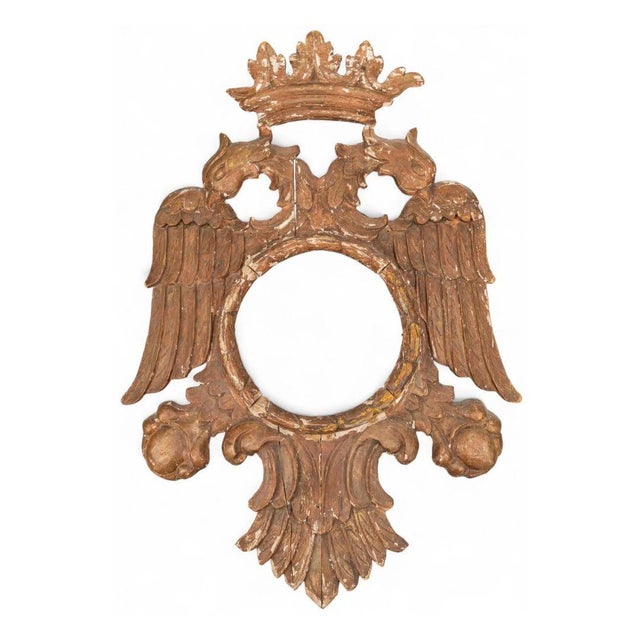 This elegant neoclassical mirror frame captures the refined beauty of classical design, showcasing intricate details like...