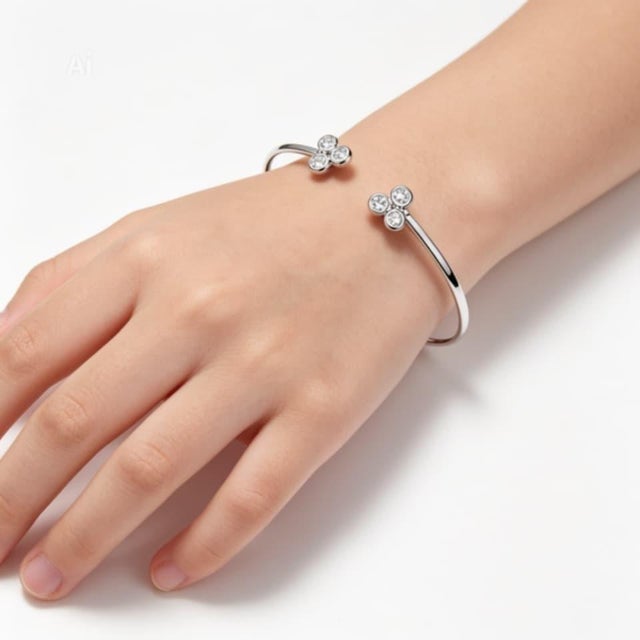 Add a touch of elegance with this Estate 14K White Gold Diamond Bangle Bracelet. Crafted from 14K white gold, this...
