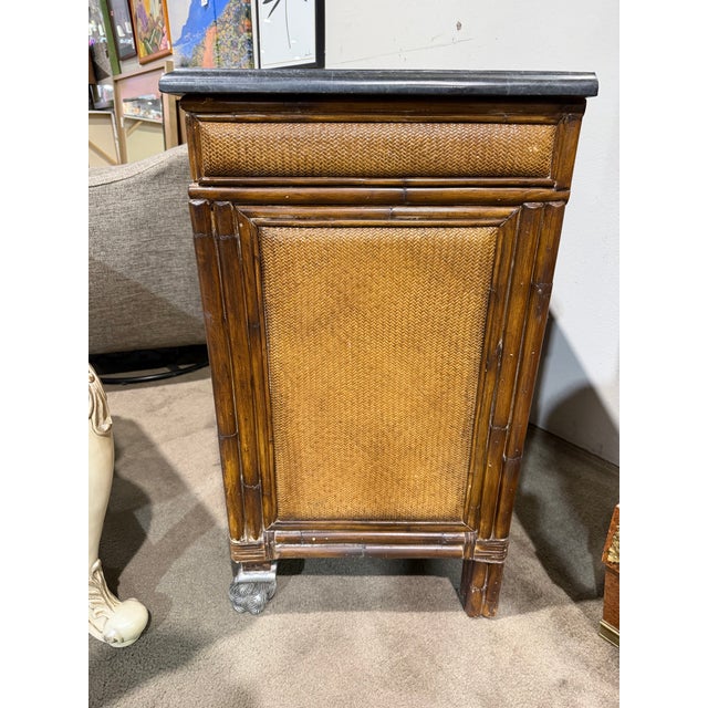 This distinguished cabinet from the Ernest Hemingway Collection by Thomasville reflects the collection’s signature blend...