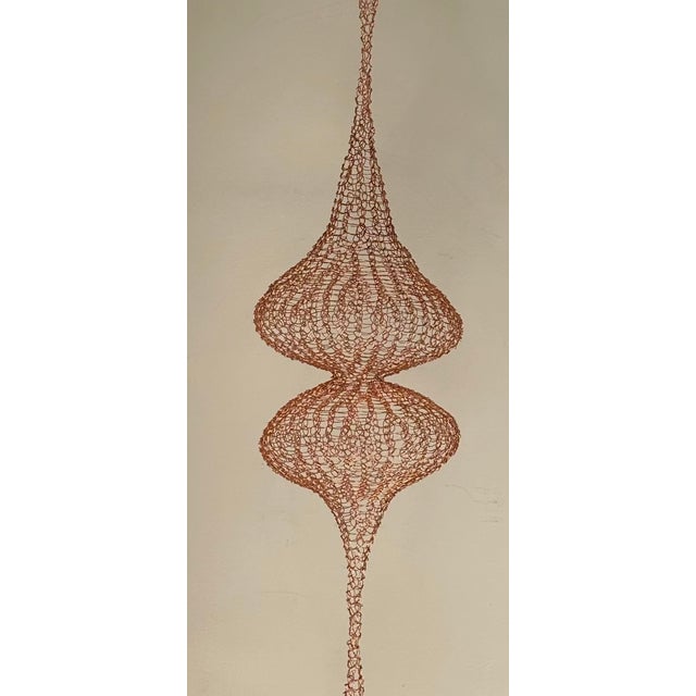 Handmade copper wire sculpture inspired by the handwoven technique of Ruth Asawa.
