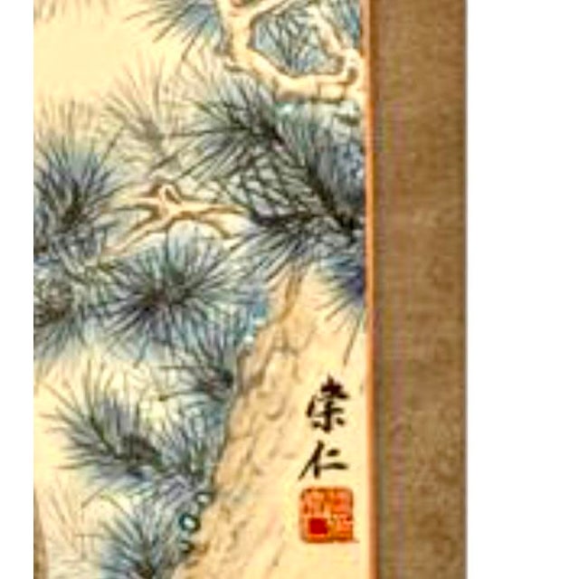 Offered here is a beautiful Chinese hanging scroll painting by Zhang Chongren (1907–1998) depicting a commanding eagle...