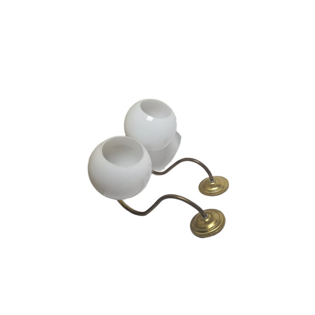 A pair of wall lamps come from the 1950s. They are in good condition. European Plug (up to 250V).The wiring of this item...