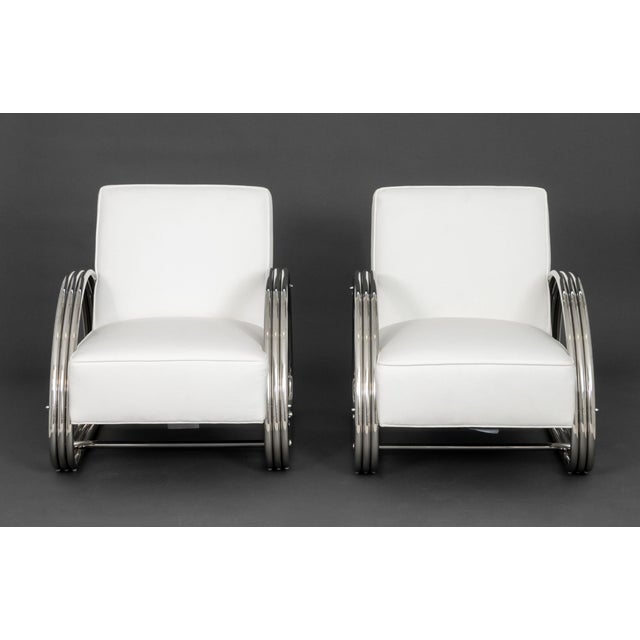 Pair of Ralph Lauren "Hudson Street" Lounge Chairs, with white leather upholstery and polished stainless steel frame,...