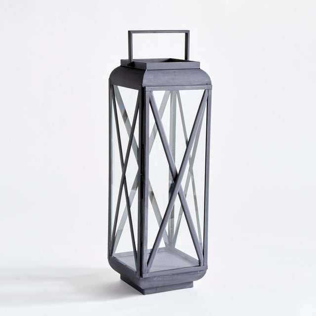 Although it has a traditional silhouette, this wellscaled outdoor lantern has a contemporary feel. With a look reminiscent...