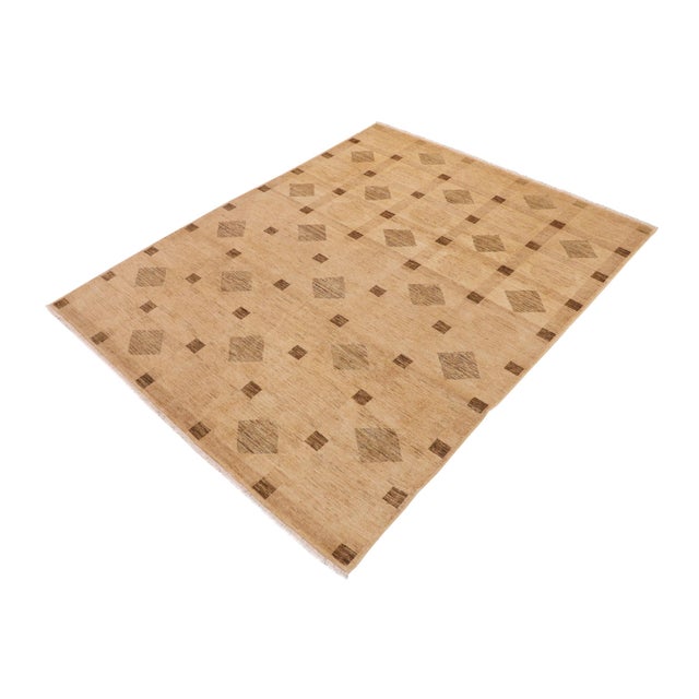 Transform your home's interior with a stunning hand-knotted Gabbeh rug. These rugs are meticulously crafted with bold...