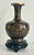 Vintage (1980's) Cloisonné Vase with Wooden Base has an Asian Style. Multi-colored. The Measurements: 4"W x 6.5"H / With...