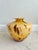 Hand blown in Italy circa 1970, this vintage glass vase features a dramatic tortoiseshell pattern with layered amber,...