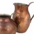 Two copper pitchers is an original decorative pair of objects realized in the second third of the 20th century. Original...