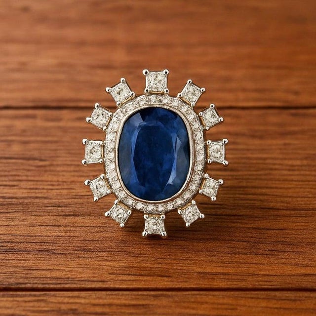 A very important and gorgeous Burma Blue Sapphire and diamond cocktail ring set in 18K white gold. The Blue Sapphire, is a...