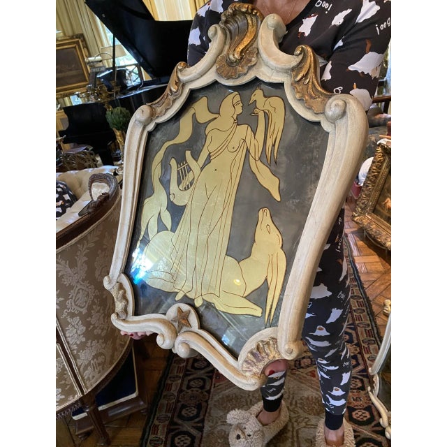 This is one in a spectacular suite of six rare Maison Jansen exquisitely stylized wall mirrors of the most versatile...