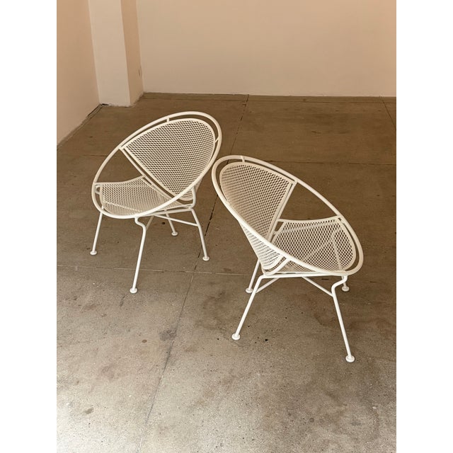 Pair of “Radar” outdoor lounge chairs designed by Maurizio Tempestini for John B. Salterini, United States, circa 1950s....