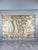 Large decorative wall tapestry depicting an elegant hunting scene in a wooded landscape, featuring figures in period...