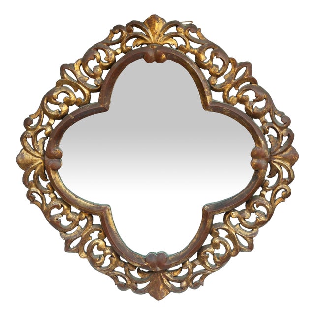 Mid 20th Century Wood Carved & Gilt Quatrefoil Framed Mirror For Sale
