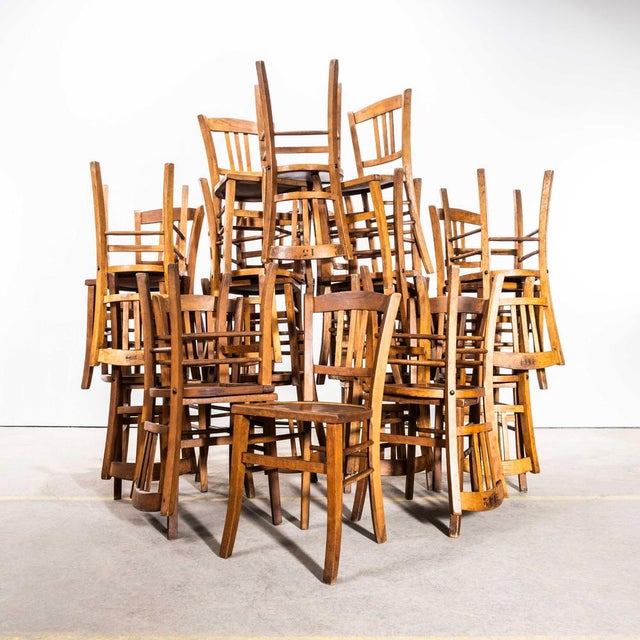 1940's French Farmhouse Dark Oak Dining Chairs. The French farmhouse dining chairs in a dark oak bring timeless elegance...