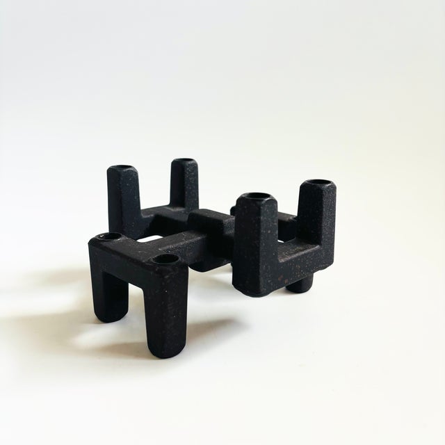 A set of 2 mid century cast iron tiny taper candle holders. Great stacking and reversible design. Made to hold up to 4...