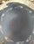 This is a hand-coiled Mata Ortiz black-on-black pottery vessel with intricate dotted geometric designs. It is signed on...